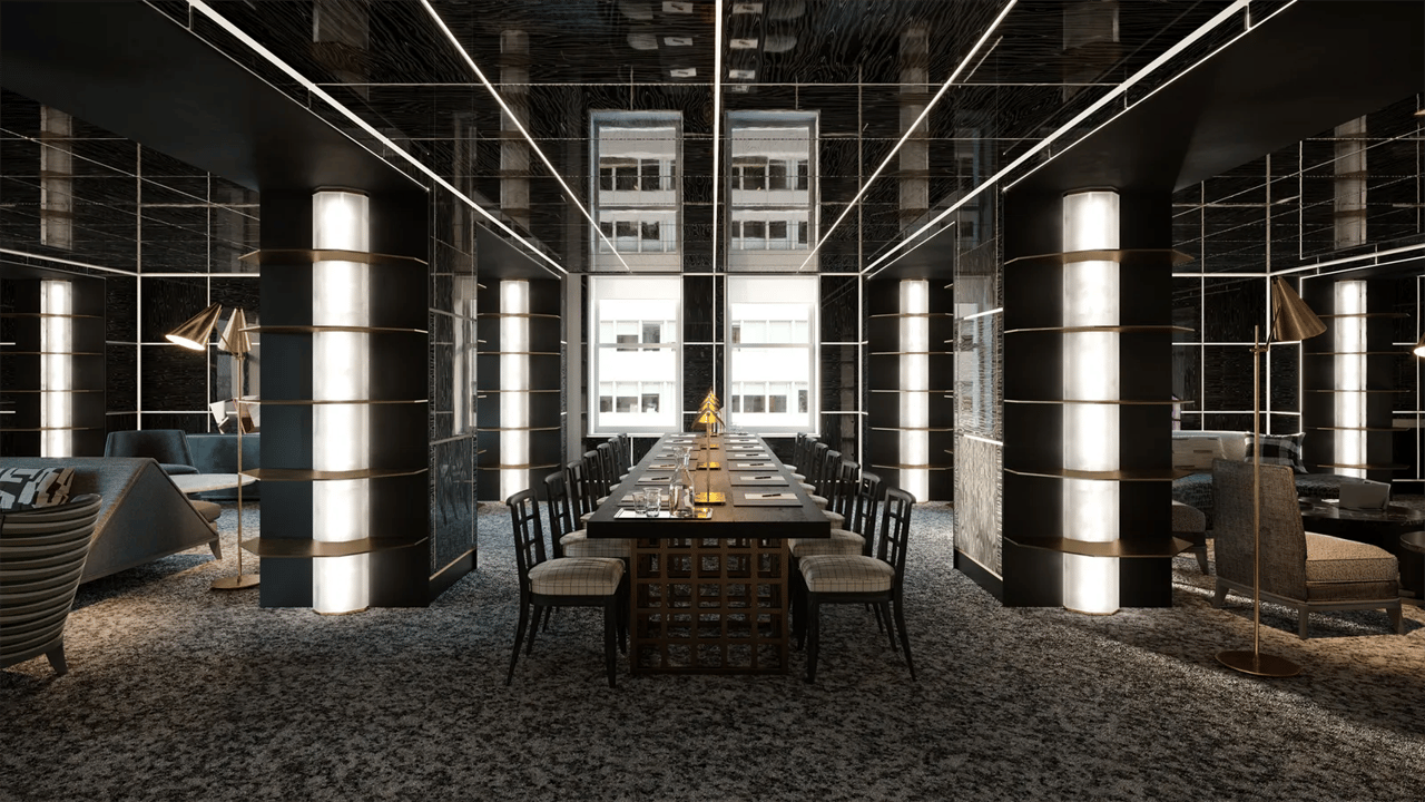 Shared dining room with a long table, mirrored black walls, and illuminated columns.