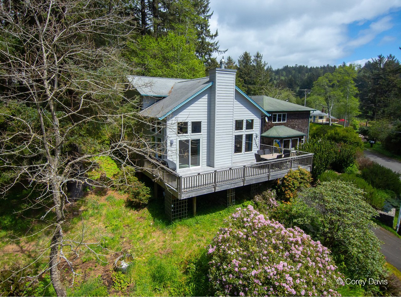 Sold ocean-view home at 37255 Second St in Neahkahnie Oregon represented by Meadow Davis of Home + Sea Realty near beach trail access