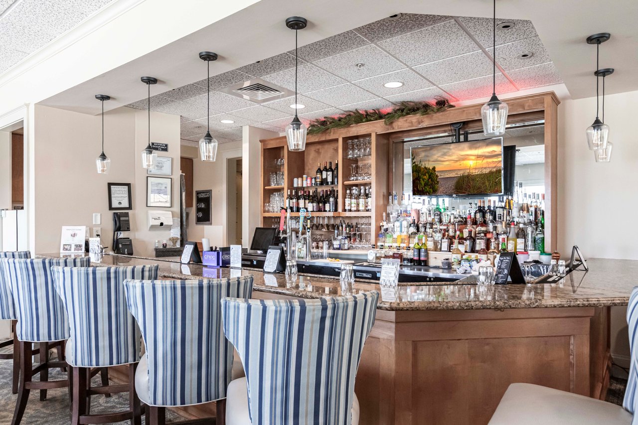 Elegant bar inside Longshore Lake clubhouse in North Naples community