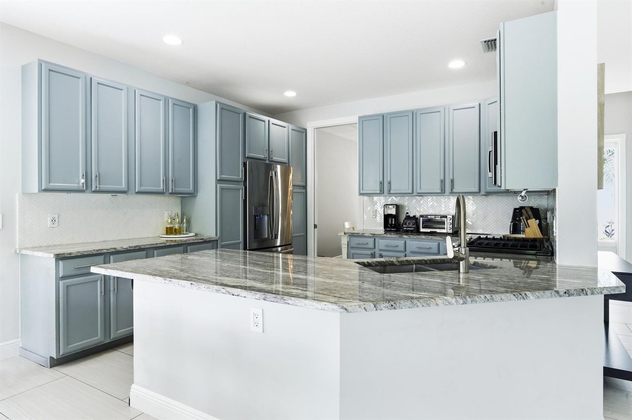 573 Cocoplum Drive, E