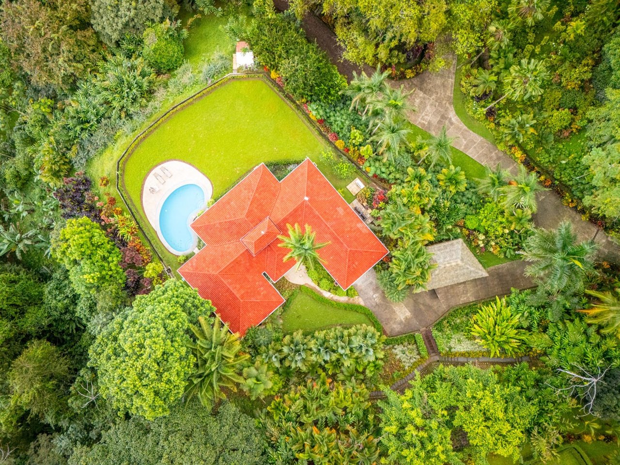 Ocean, jungle & mountain views on a meticulously landscaped 3-home family compound