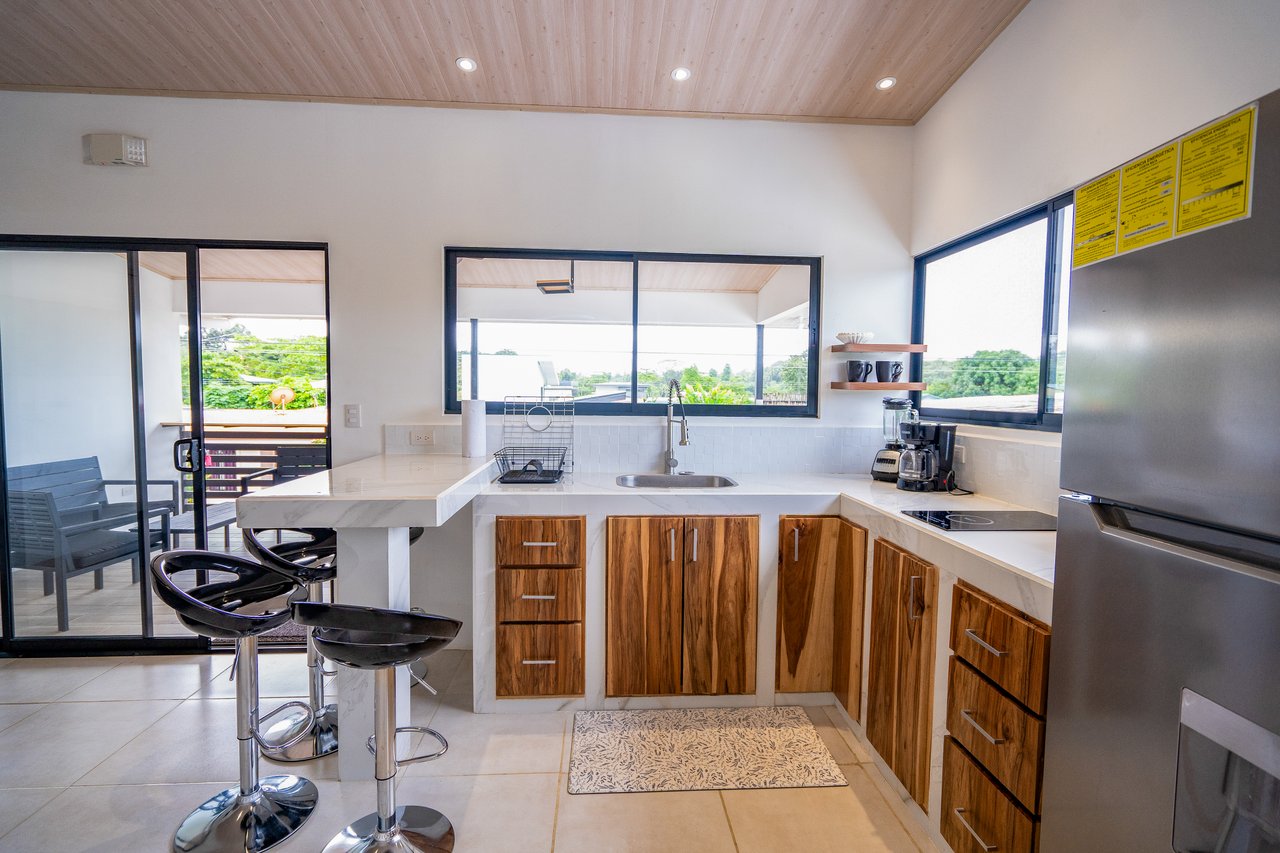 A House With An Upper Live-In Suite & Two Fully Serviced Downstairs Rental Apartments Less Than 1 km From The Entrance to Marino Ballena National Park