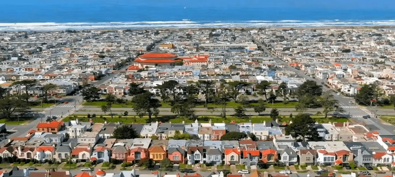 Aerial view of San Francisco’s Outer Parkside neighborhood with rows of colorful homes near Ocean Beach and Sunset Boulevard