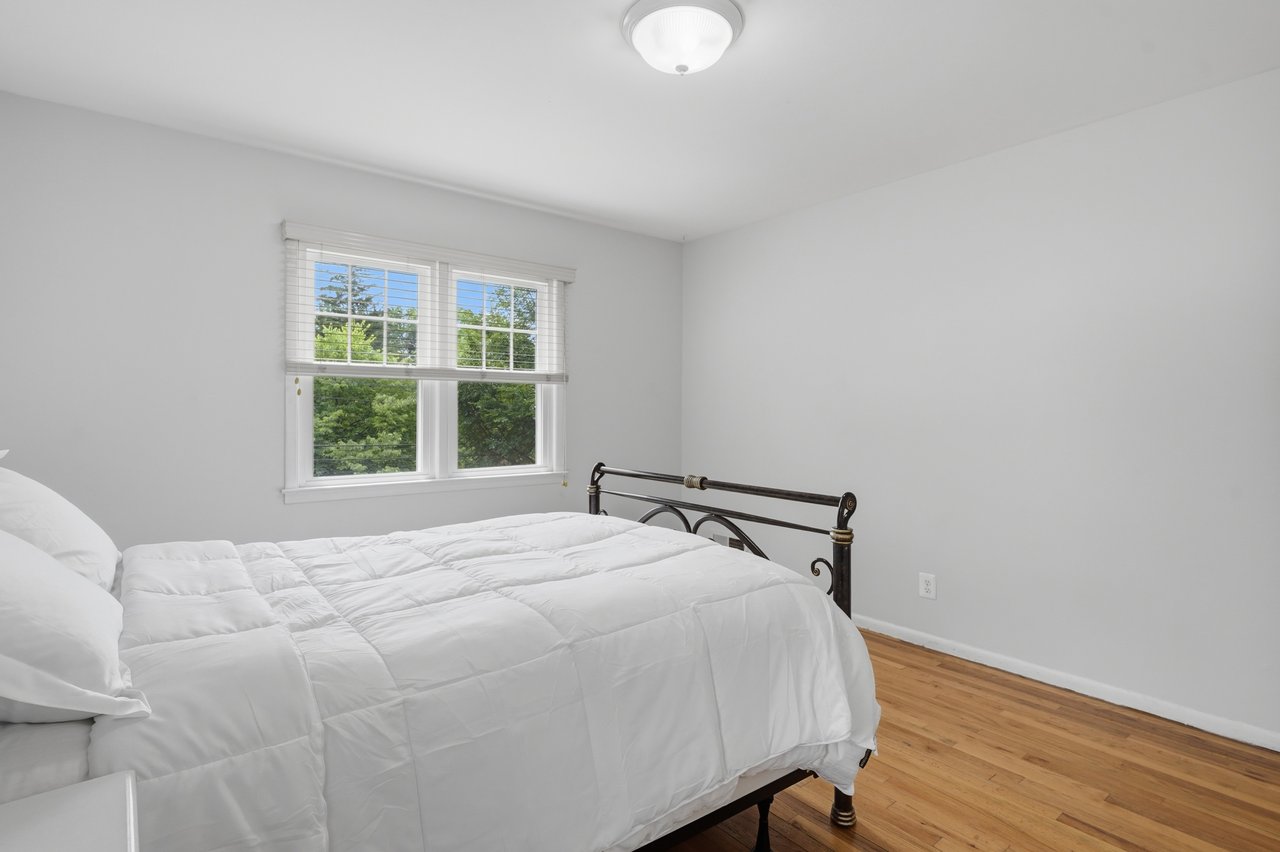Bedroom with street views