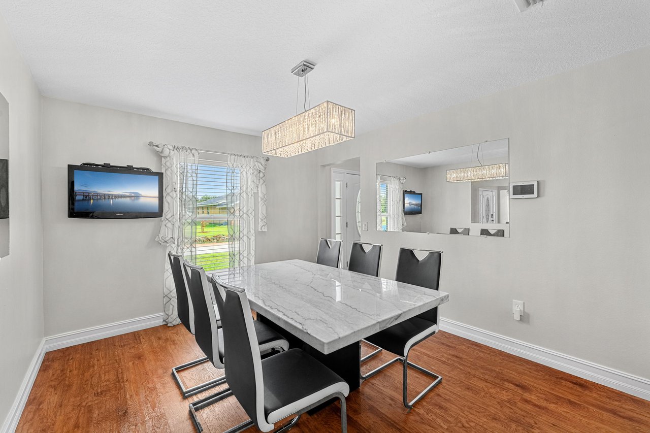 Dining area with wood-look flooring