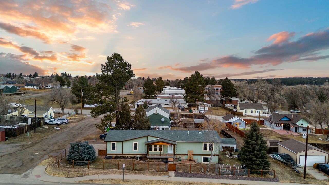 Remodeled modular home in Elizabeth Colorado sold by Aaron Johnson of Johnson Team featuring large lot and mature landscaping
