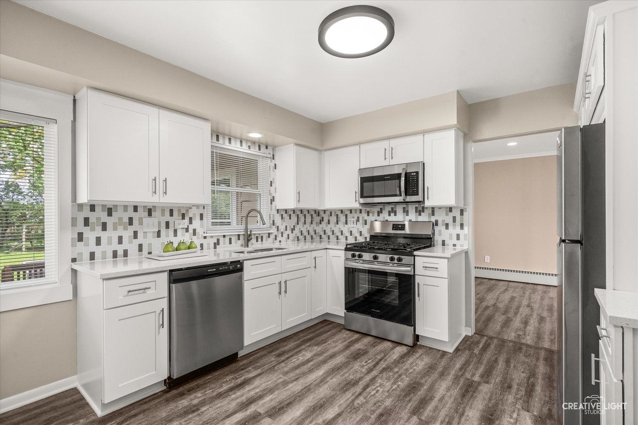 New kitchen with quartz countertops and white shaker cabinets at 1638 Virginia Street Downers Grove