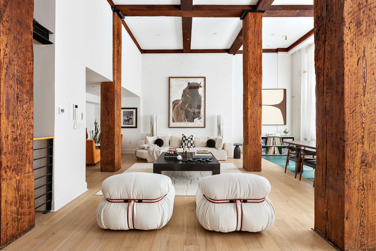 Once a coffee warehouse, this $11M Tribeca townhouse is a three-level condo with a hot tub in the back
