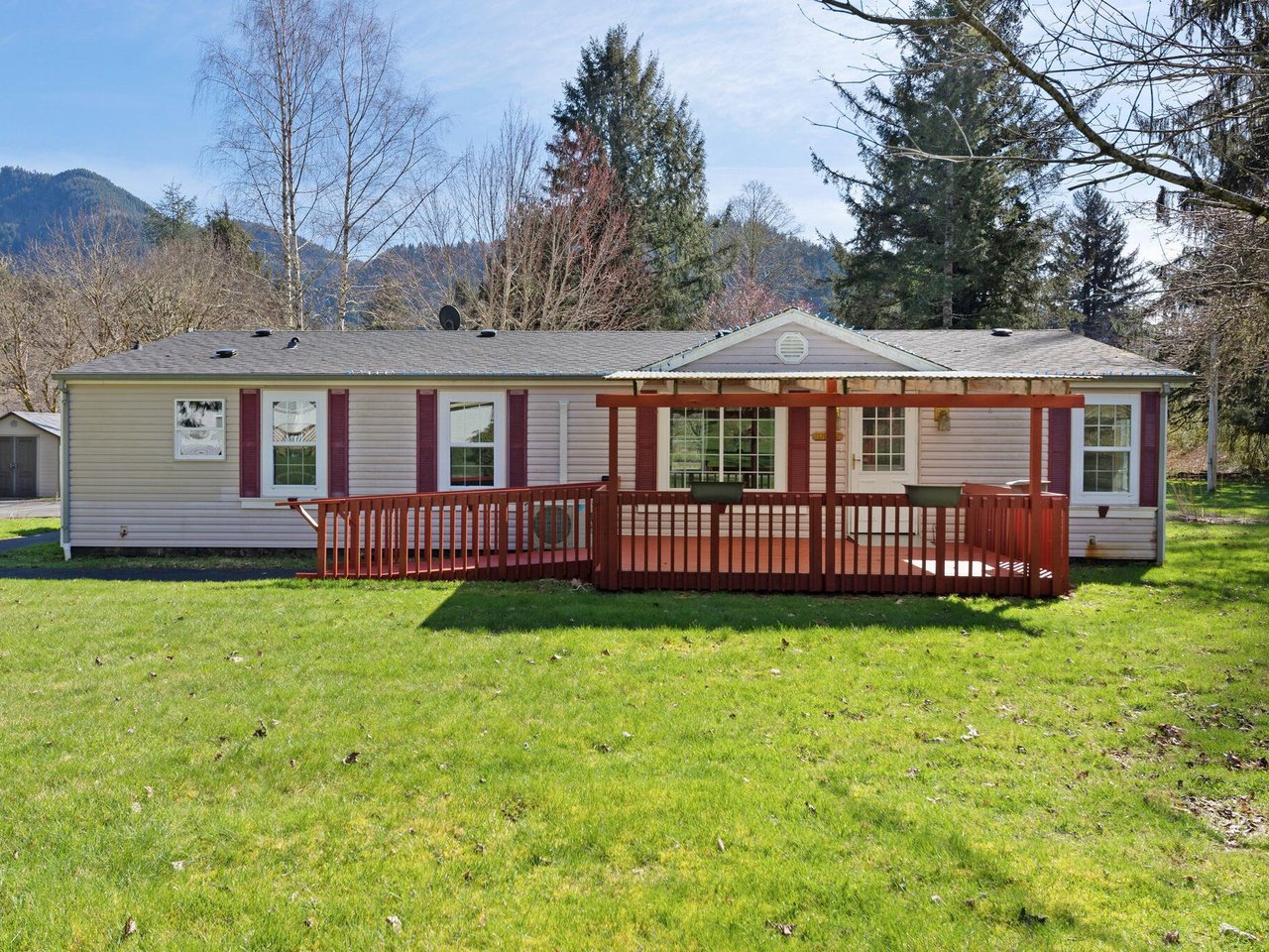 Exterior view of the sold manufactured home at 16615 Southpoint Dr in Nehalem, Oregon