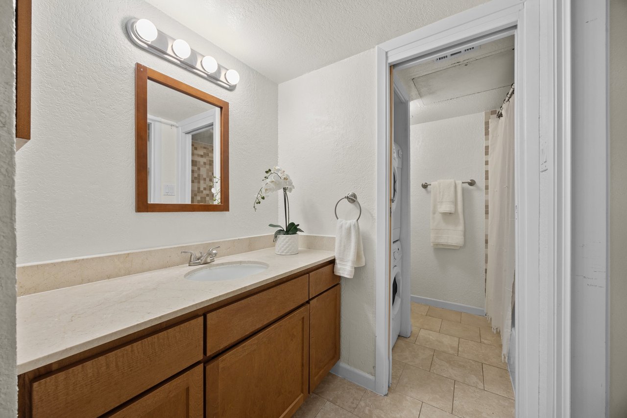 Top-Floor Condo Retreat in Gated Ivy Condos | Private Balcony + Tree-Filled Views
