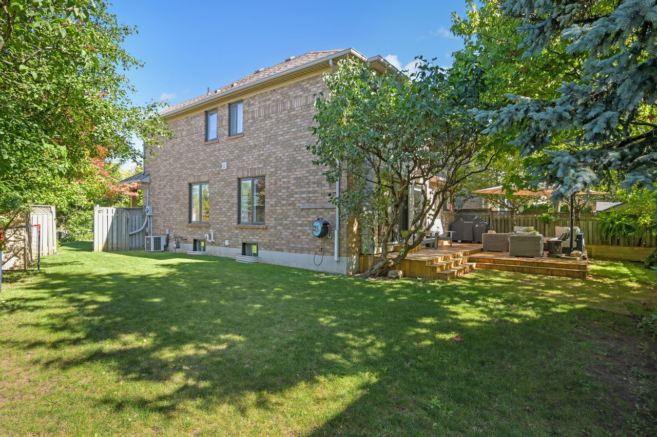 Sun-Filled Sophistication on a Rare Pie-Shaped Lot in West Oak Trails