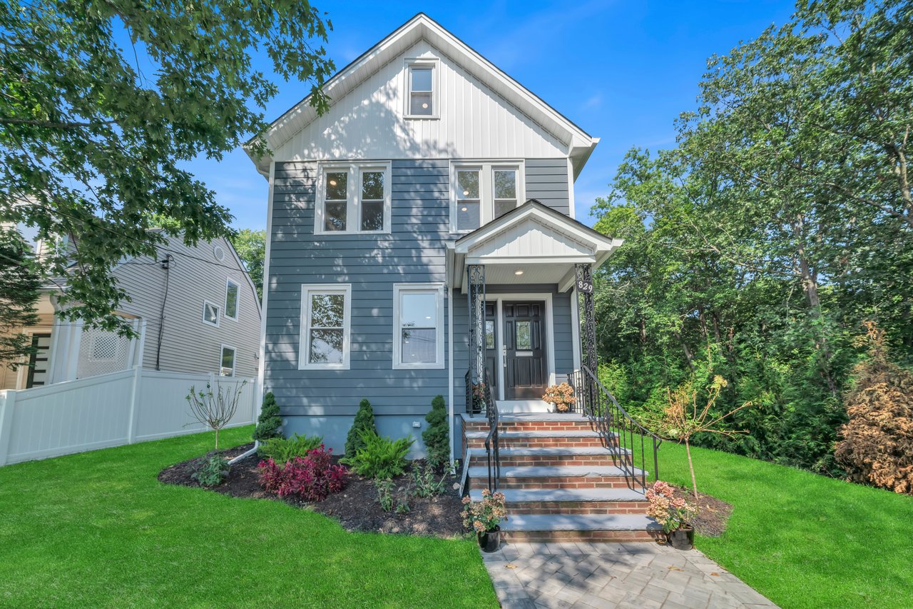 norwood-nj sold home exterior with stone veneer and manicured front lawn