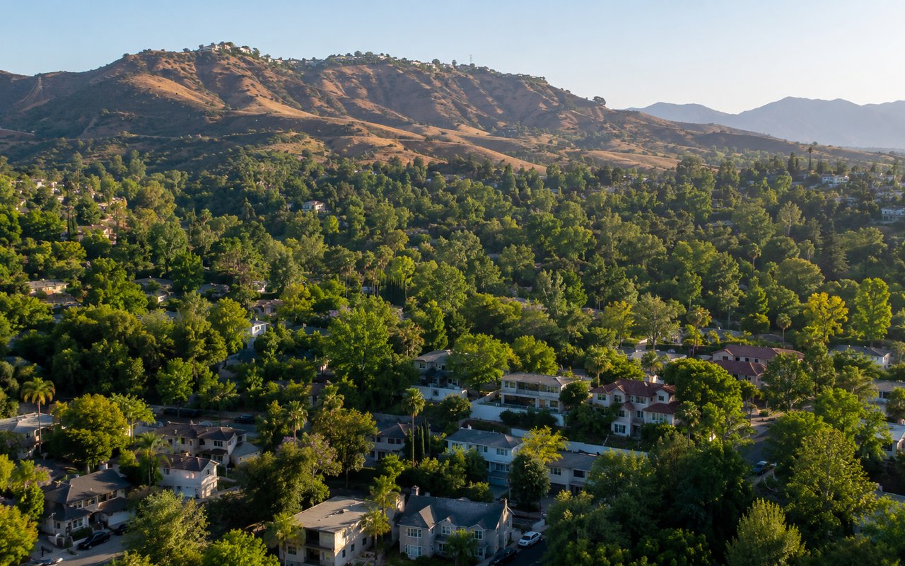 Tree-lined street and hillside trail in Woodland Hills California