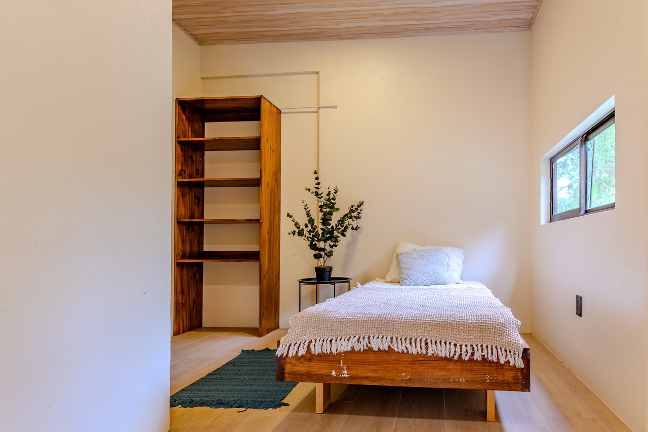 Modern 4BR Homestead with Creek & Food Forest | In-Demand Opportunity