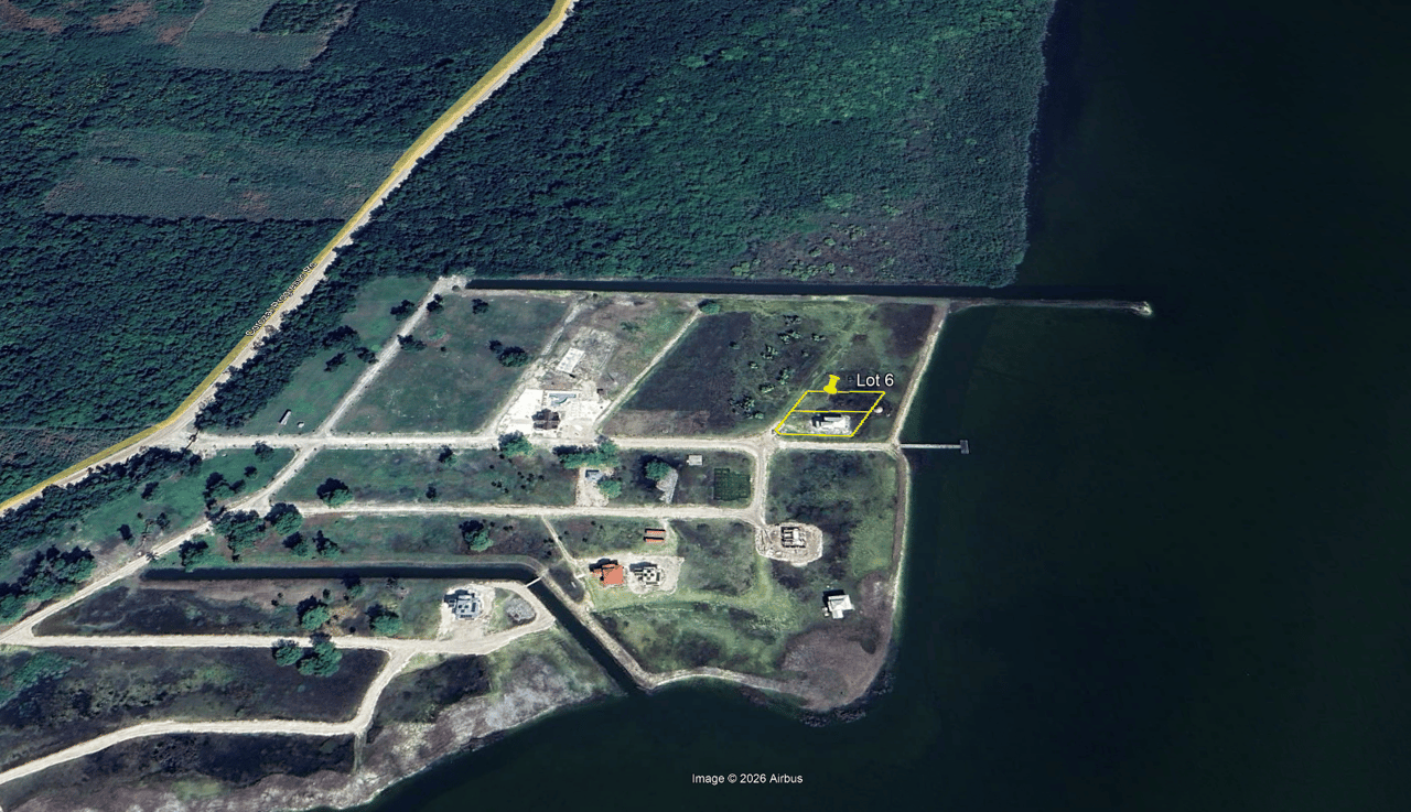Vacant waterfront lot in a luxury master-planned gated residental community in northern Belize