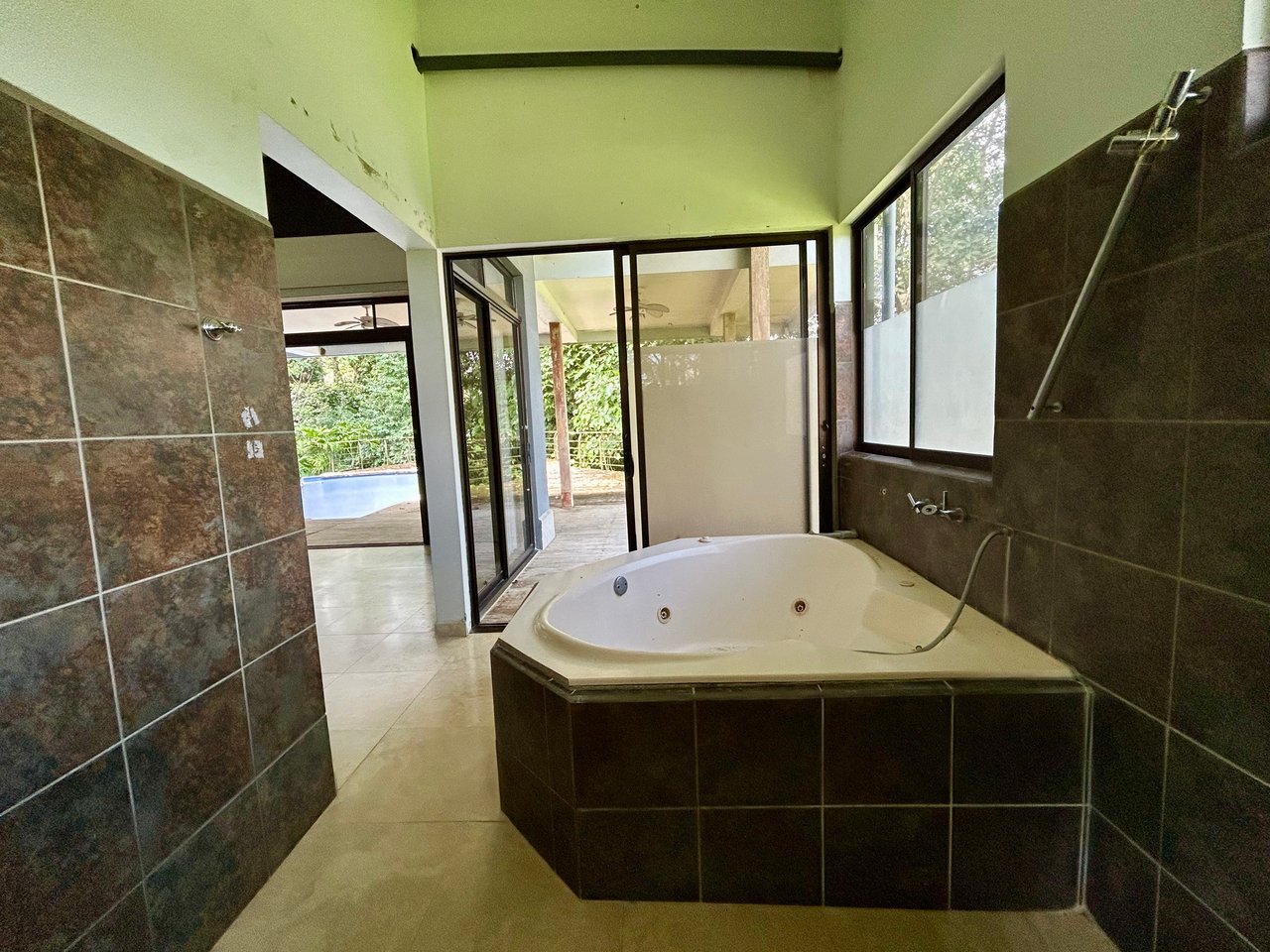 Fixer-Upper Home with an studio Office in Palmar Norte on a 4-Hectare Property