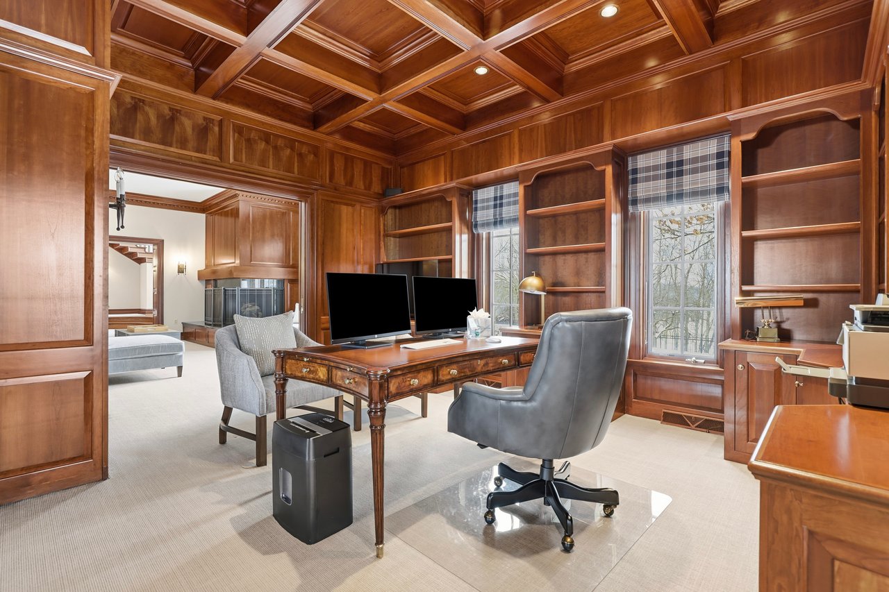 Office with coffer ceilings and secret staircase