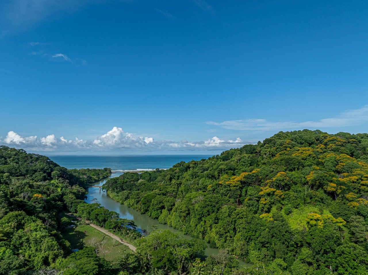 0.50 ACRES – 5 Bedroom Riverfront Modern Home, Walking Distance To Dominical!!!