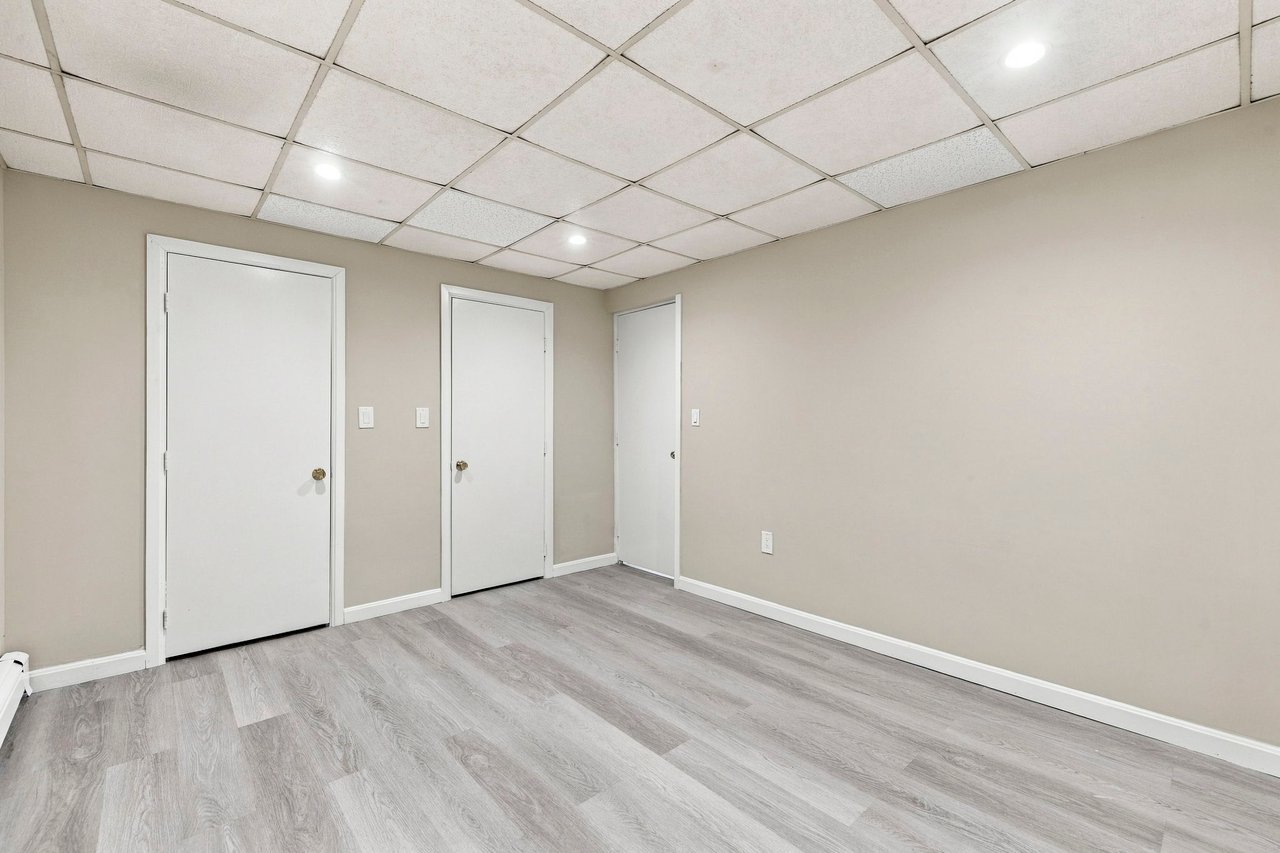 A Rare Two-Family Generational Asset with a Private Entrance to the Arnold Arboretum