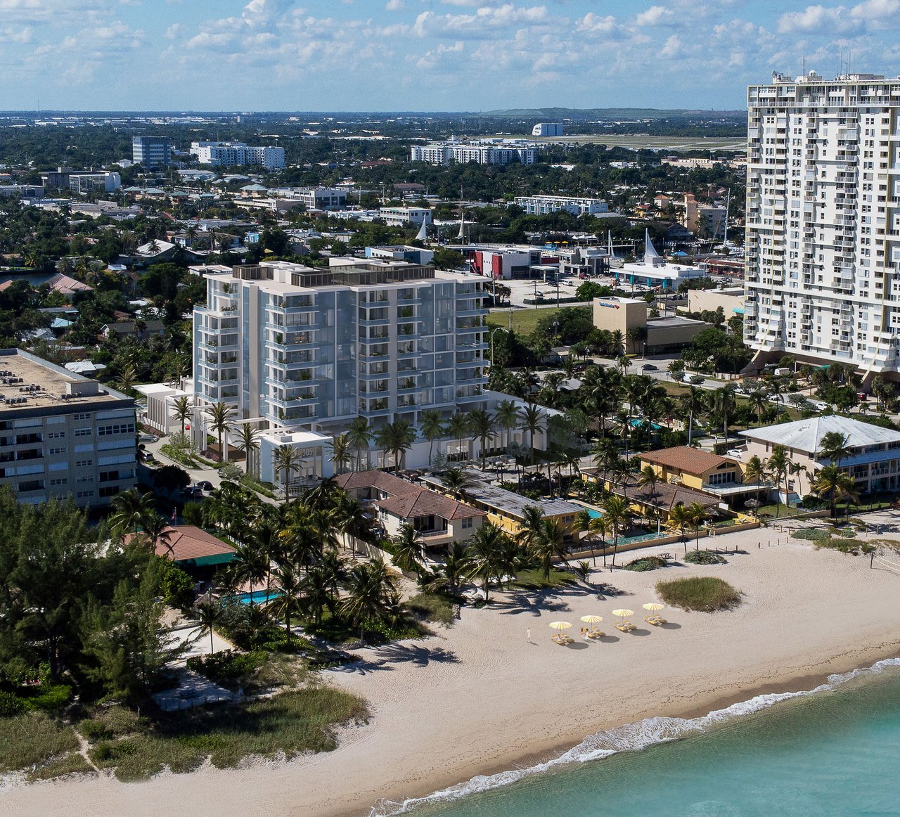 Salato Residences beachfront condominium rendering, with balconies facing the shoreline and surrounding city.