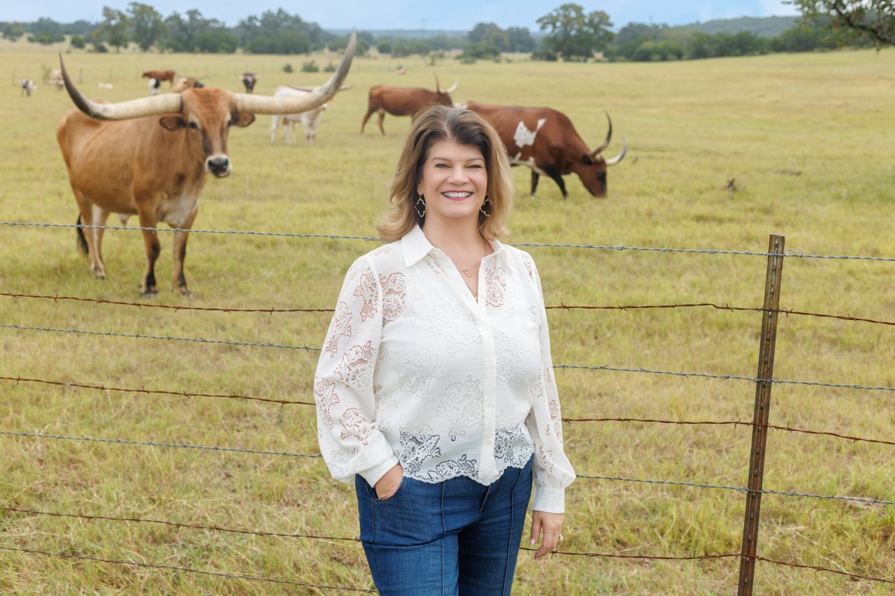 Lisa Little standing in the texas hill country