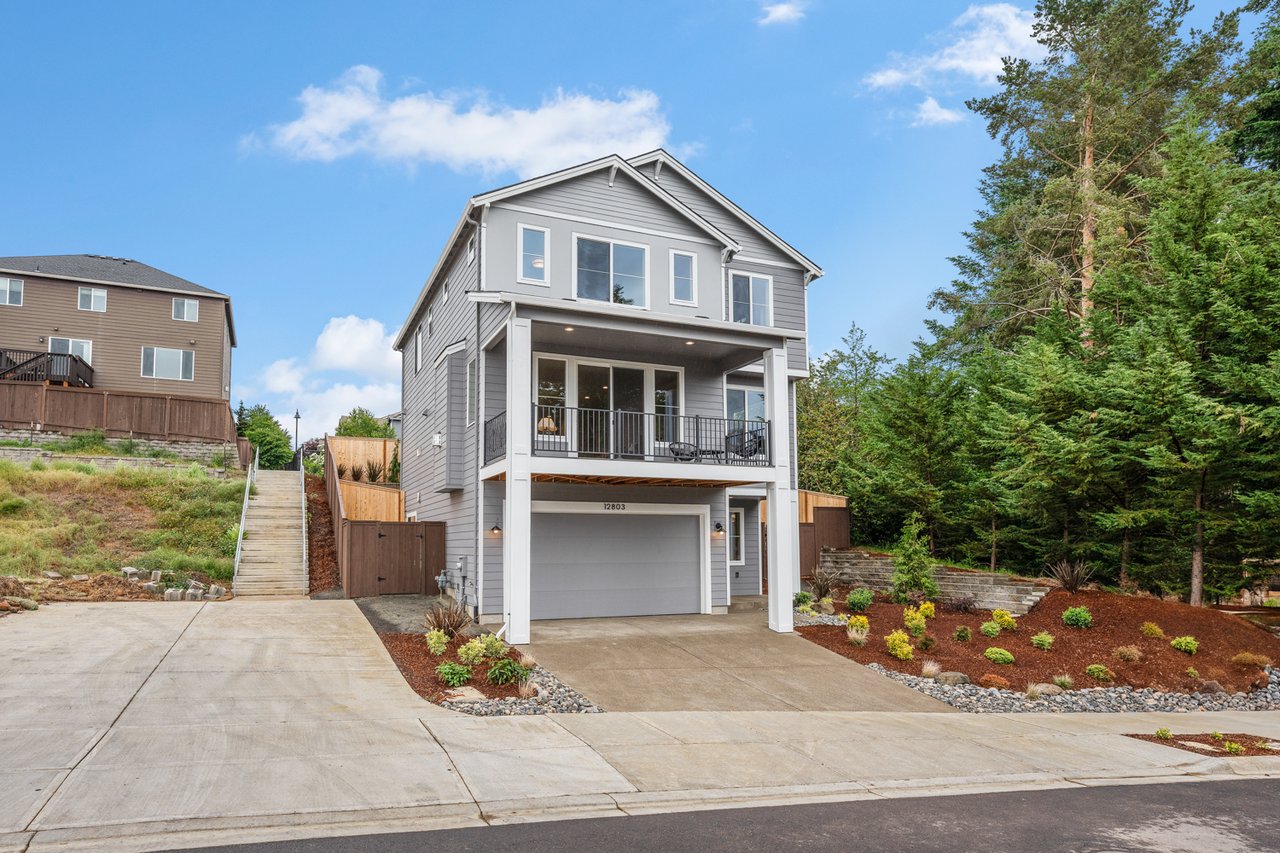 New construction home in Bethany, Oregon 97229 with modern design, two-car garage, and landscaped front yard.