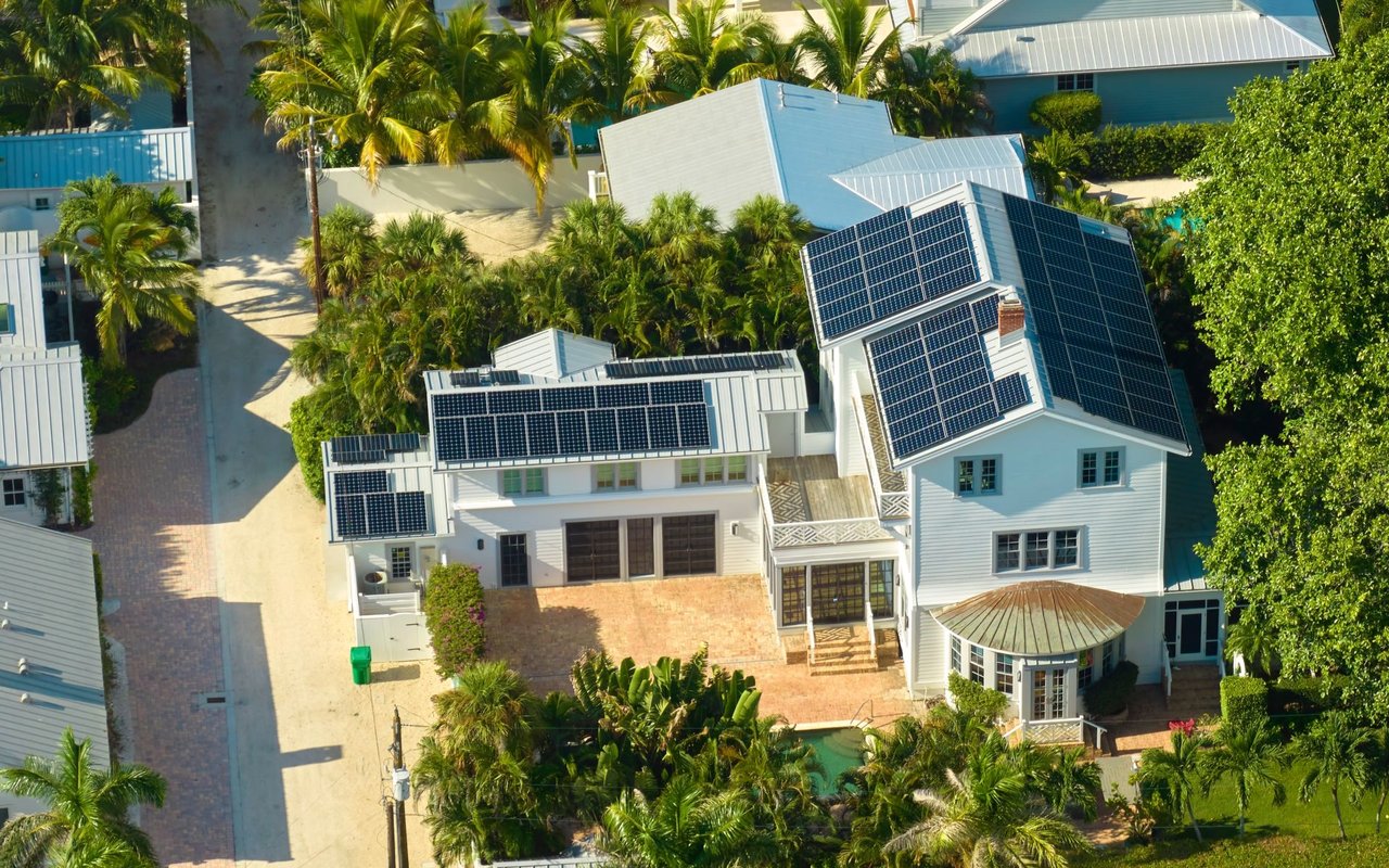 New American Residential House with Rooftop Covered with Solar Photovoltaic Panels for Producing Clean Energy - Shasta Townsend