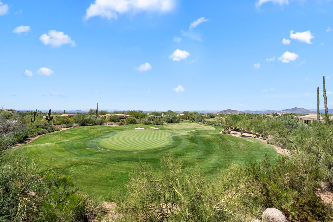 Sweeping golf & city light views