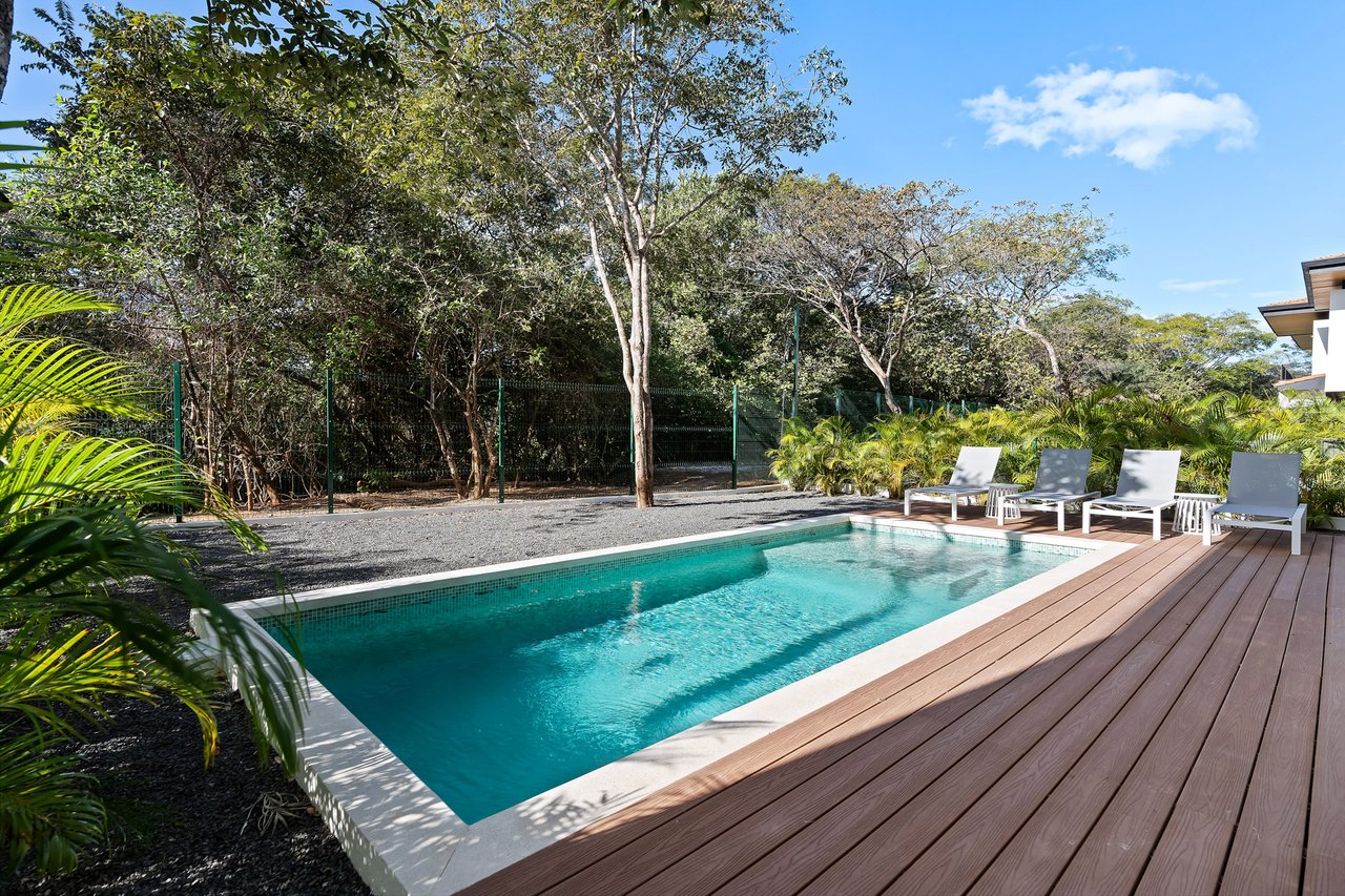 Villa Tropical Dawn | 4-Bedroom Modern Oasis in Bosques de Pinilla with Forest Views & Resort-Style Amenities