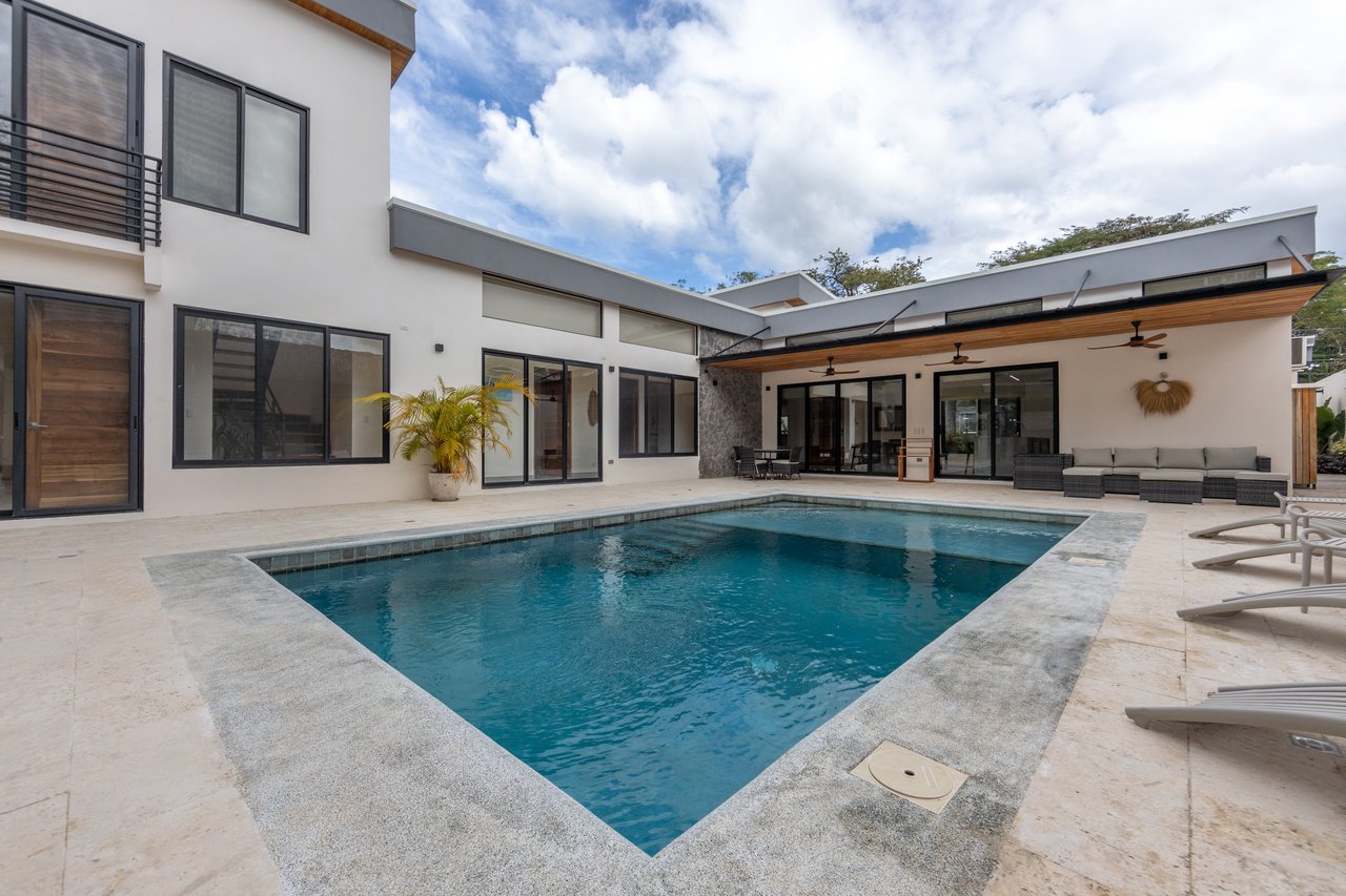Casa Guacamaya Roja Lot B20 | Elegant 4-Bedroom Home with Pool & Outdoor Kitchen, Steps from Playa Grande Beach, Costa Rica