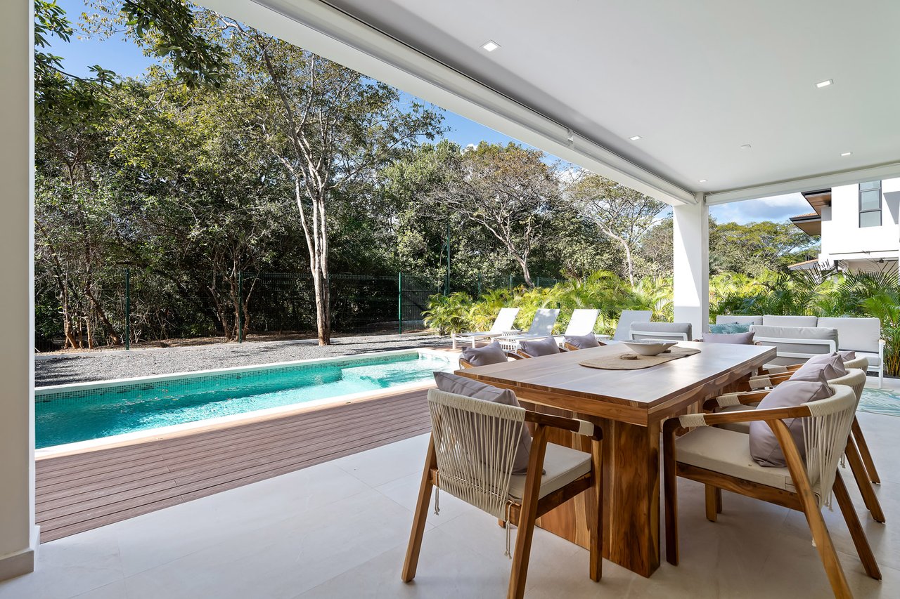 Villa Tropical Dawn | 4-Bedroom Modern Oasis in Bosques de Pinilla with Forest Views & Resort-Style Amenities