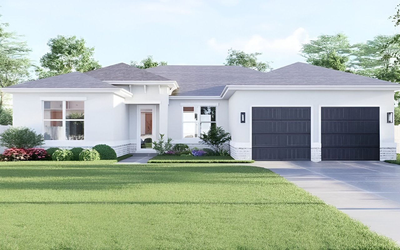 White single-story home with two dark garage doors, landscaped beds, and a broad green lawn.