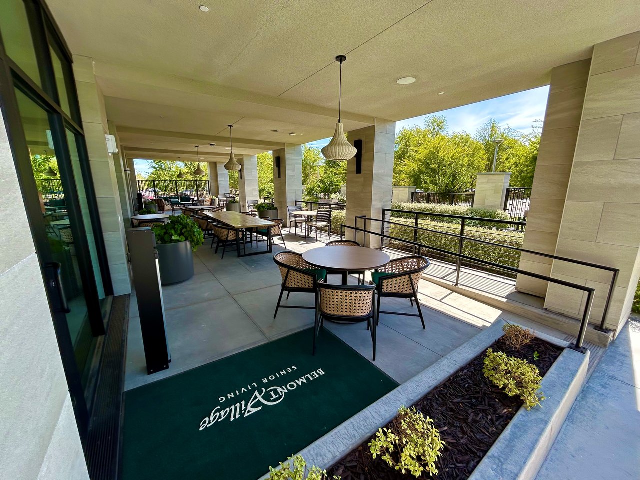 "Covered outdoor patio and dining area at Belmont Village San Ramon"