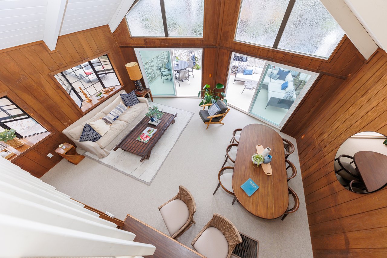 Iconic A-frame architecture living room with protected ocean view balcony in del-mar-ca-92014