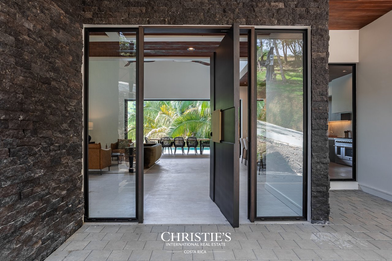 Modern Tropical Ocean & Mountain View Home