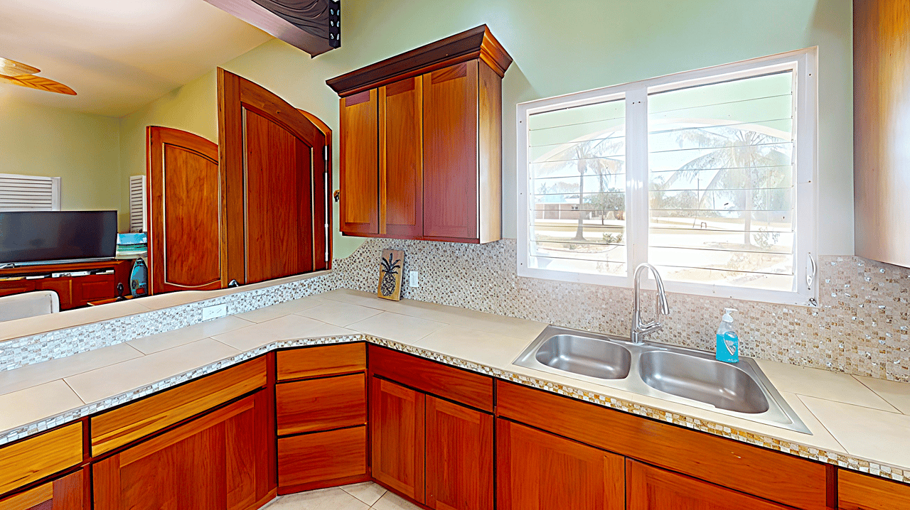 Waterview Villa steps away from 9 hole golf course and the Caribbean Sea