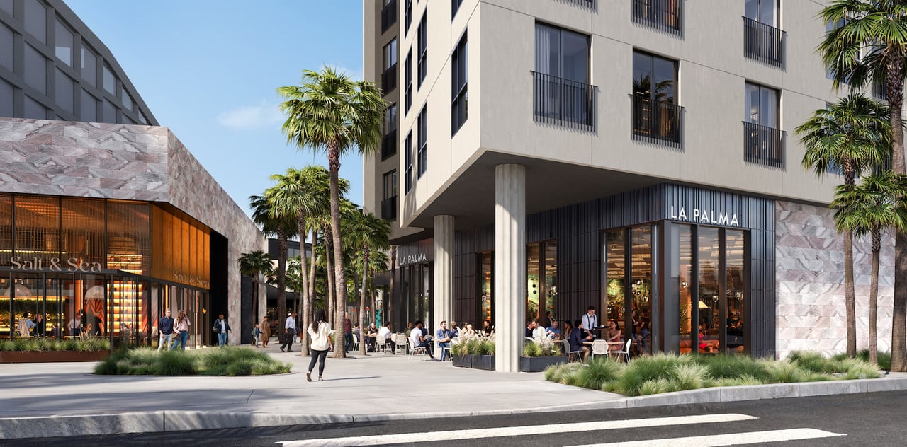 Cello Tower’s street-level frontage with palm trees, outdoor dining, and La Palma and Salt & Sea storefronts.