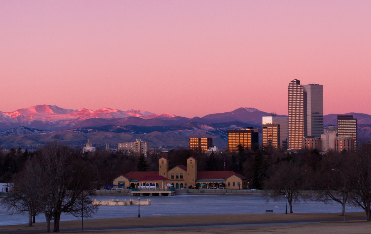 View of Denver skyline from City Park in the winter with the mountains in the background