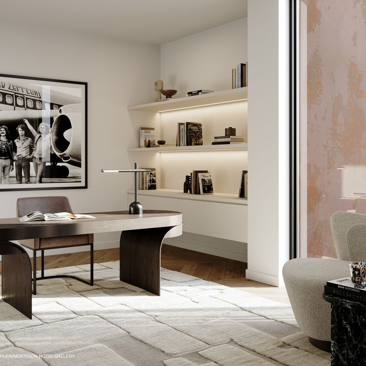 Furnished study with a sculptural desk, illuminated shelves, and framed Led Zeppelin artwork.