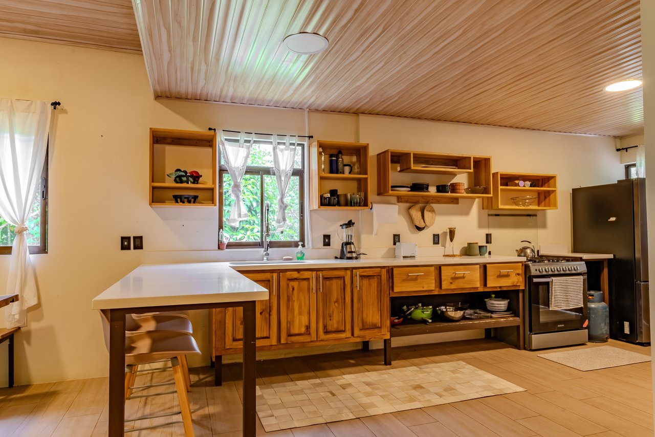 Modern 4BR Homestead with Creek & Food Forest | In-Demand Opportunity