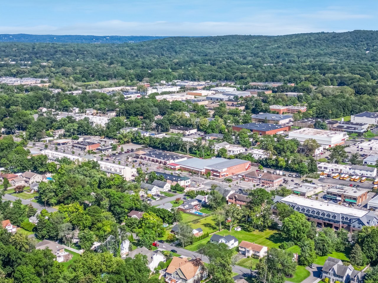 Aerial view of Norwood, NJ showing tree-lined streets and the town's central business district