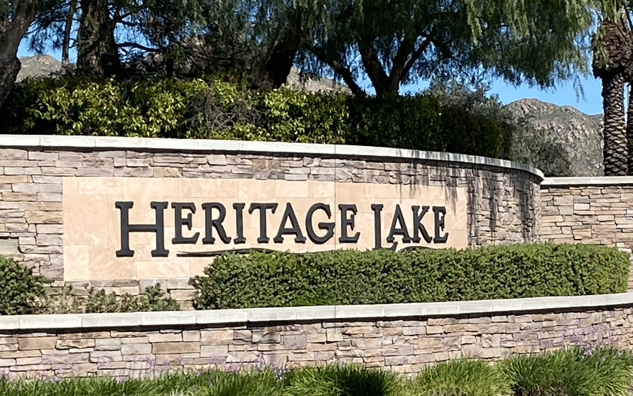 The scenic monument sign for Heritage Lake, a premier master-planned community in Menifee, CA.