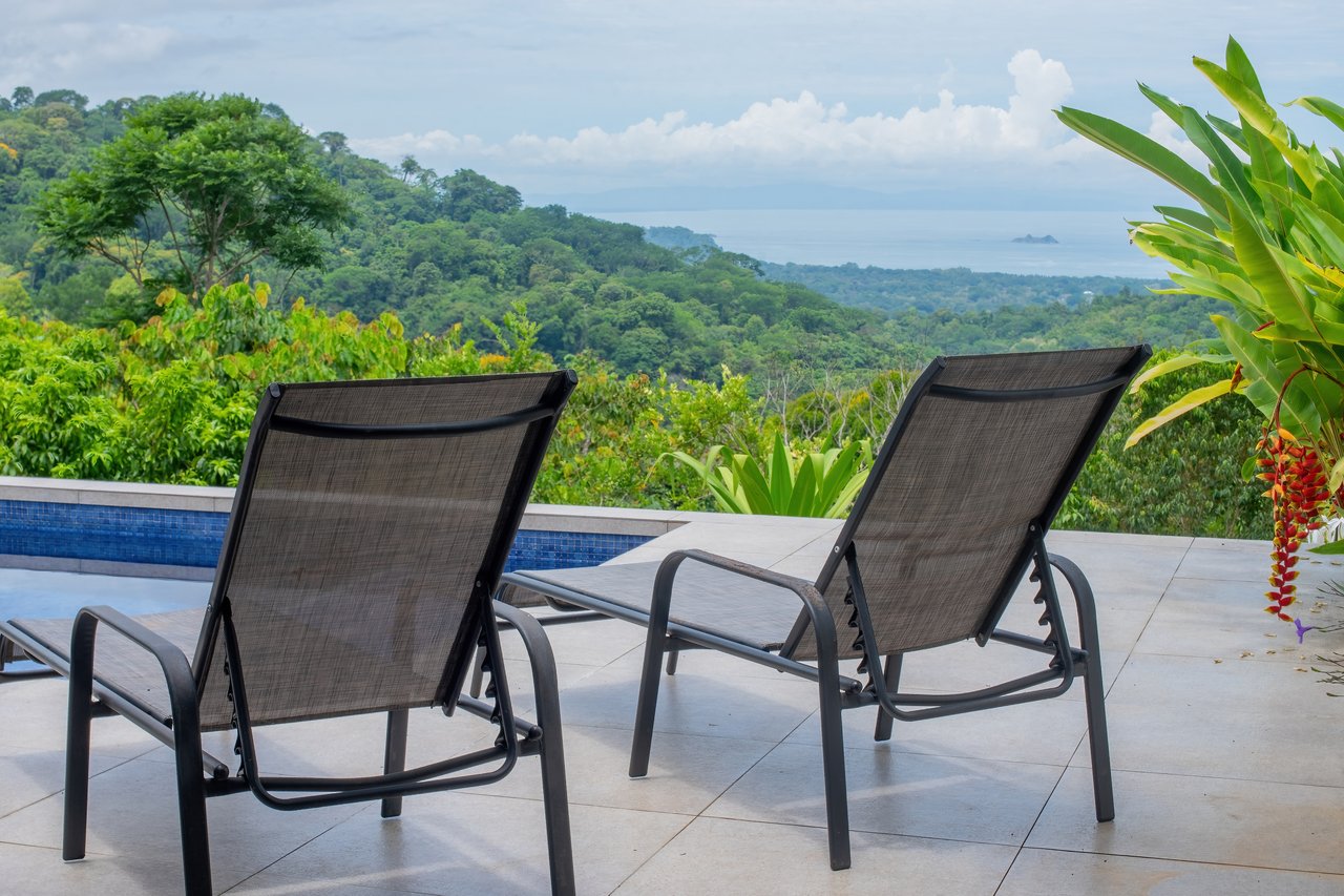 6.45 ACRES – 3 Bedroom Luxury Ocean View Home Surrounded By Vibrant Rainforest And Wildlife!!!
