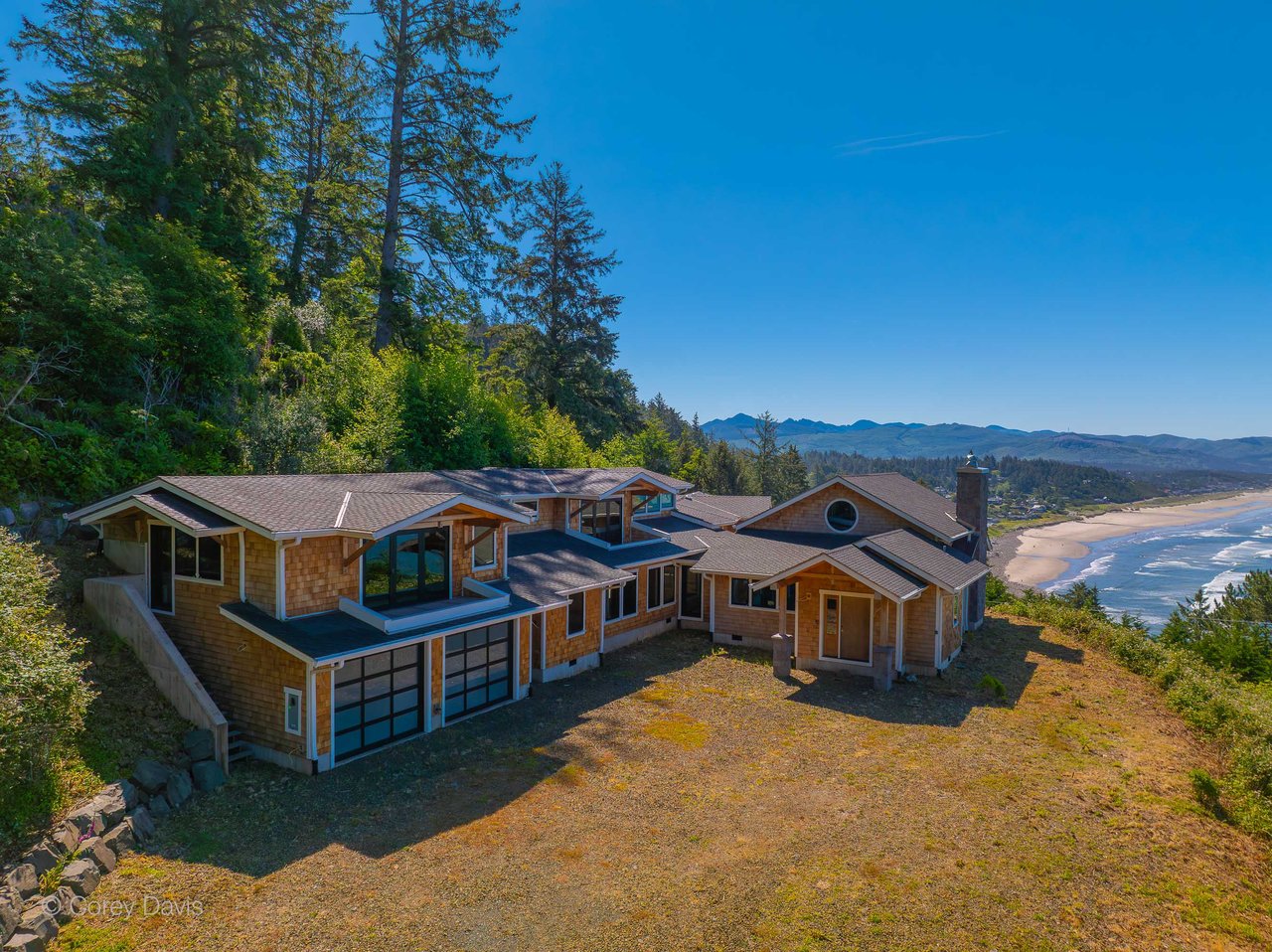Exterior view of the sold custom coastal home at 38625 Beulah Reed Rd in the Neahkahnie area of Manzanita, Oregon