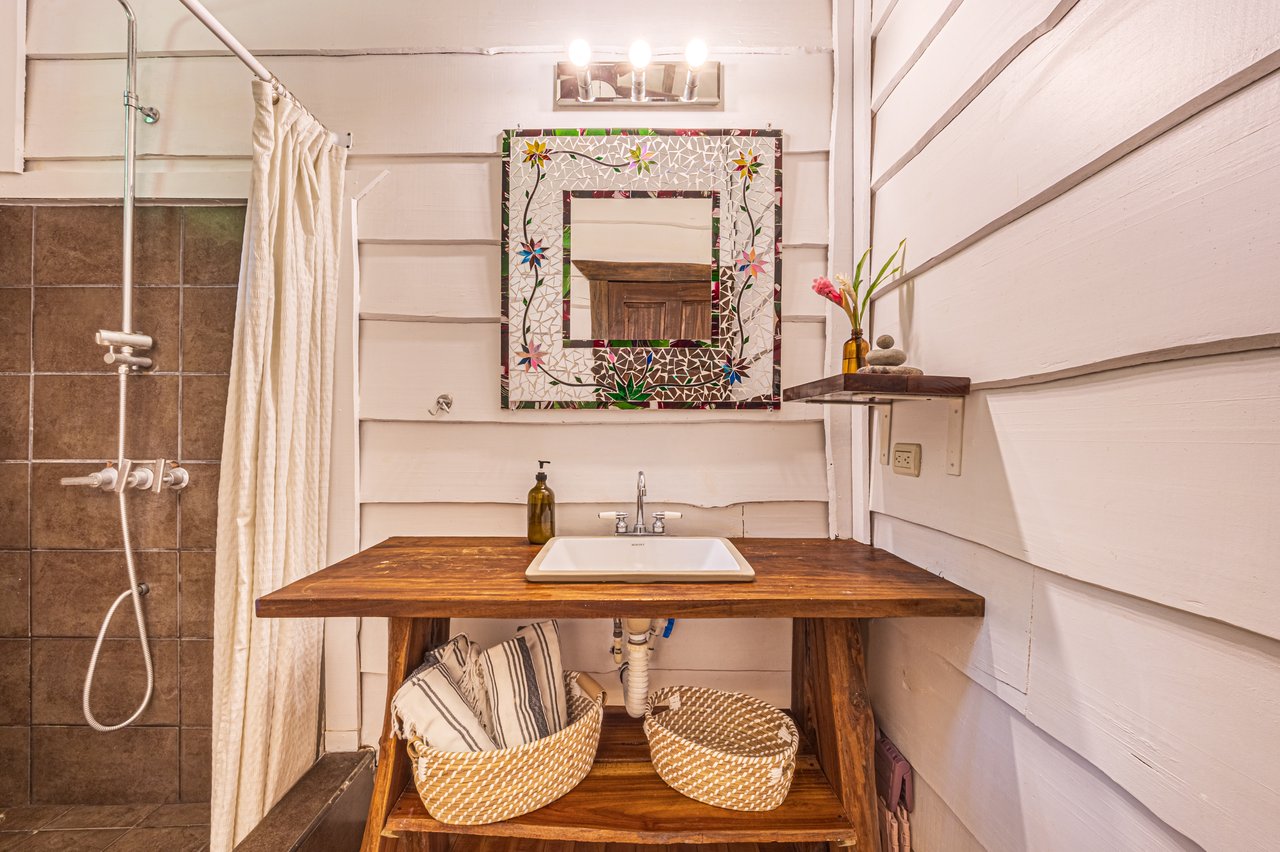 A Jungle House Built of Wood & River Dreams