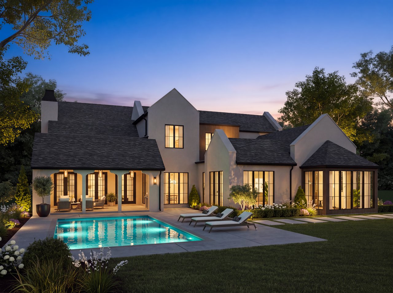 Modern two-story home with glowing windows, a turquoise pool, and patio loungers at dusk.