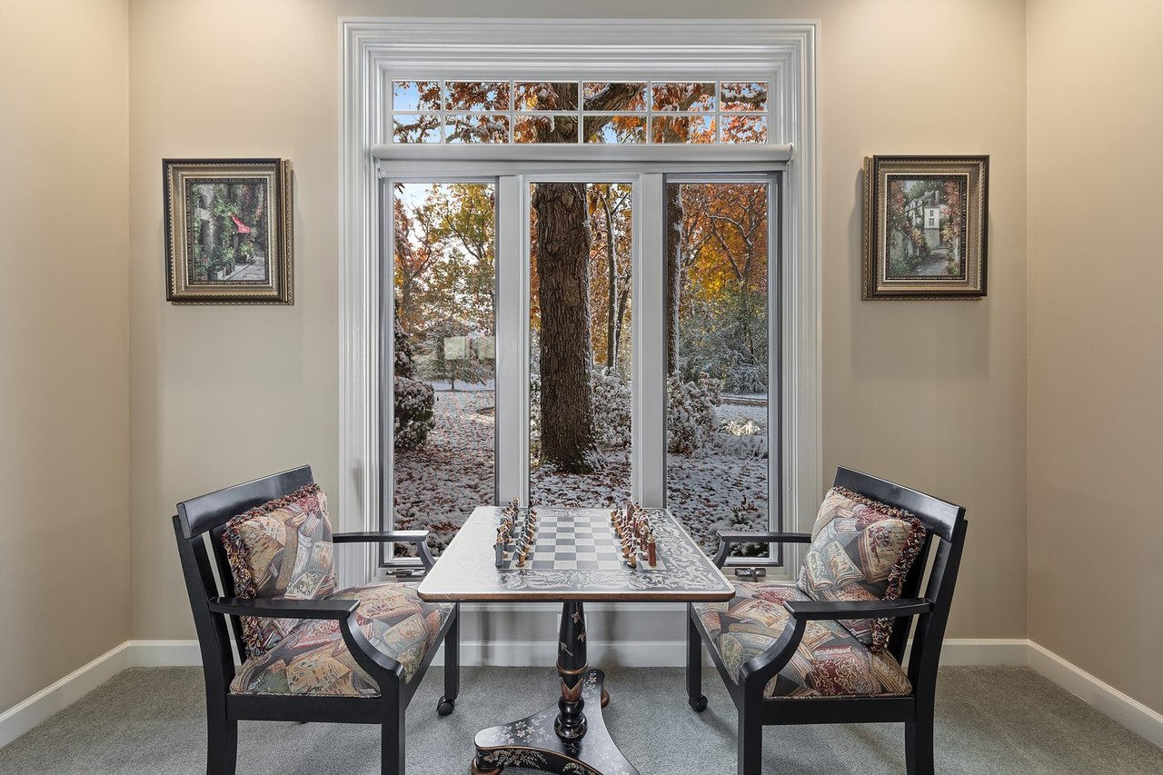 Beautifully Appointed Home in a Gated Community on Over an Acre of Professionally Landscaped Grounds with Pond Views