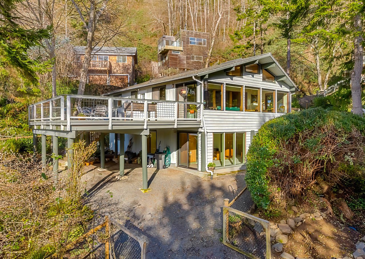 Exterior view of the sold NW contemporary home at 38475 Beulah Reed Rd in the Neahkahnie