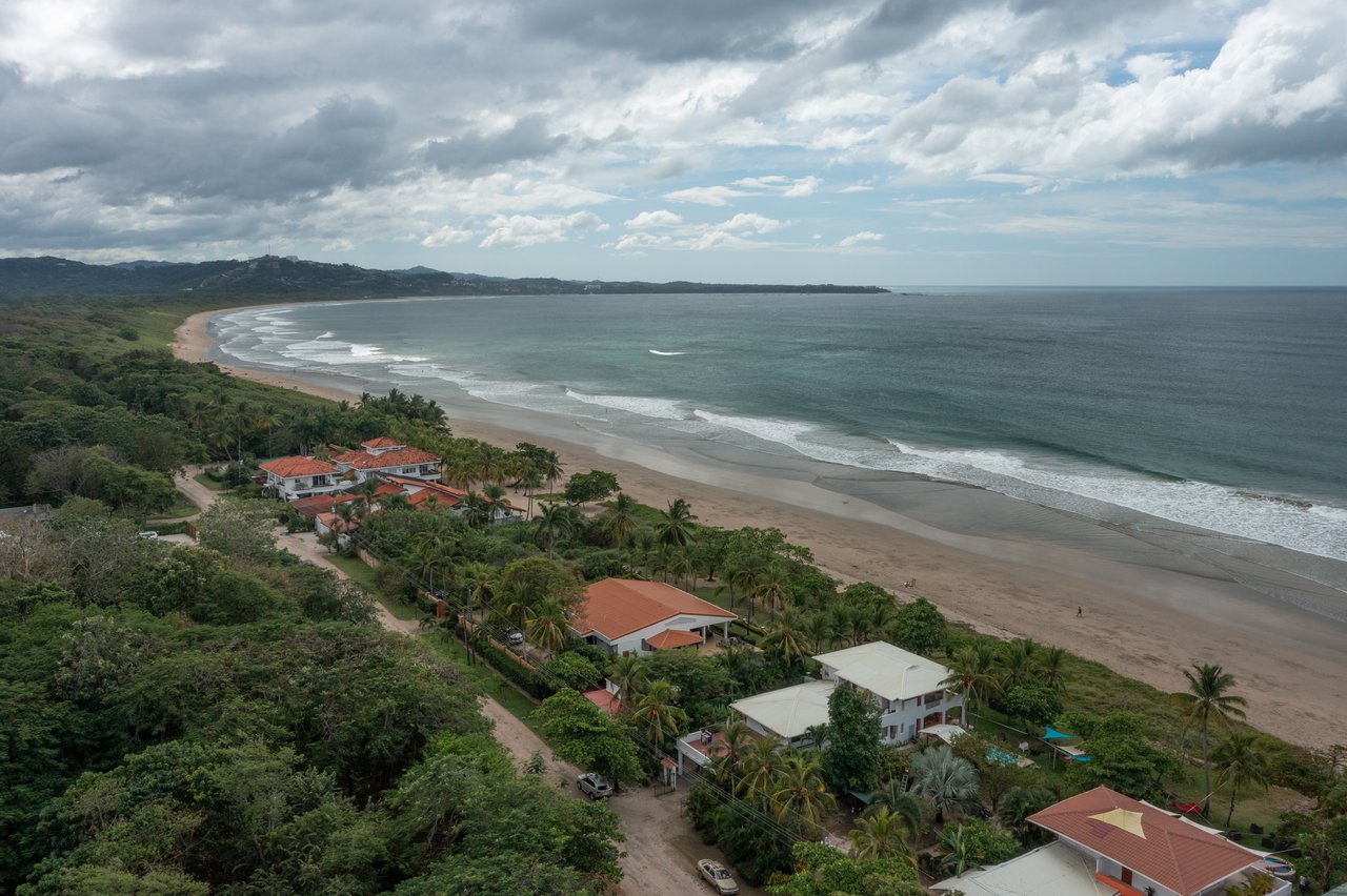 Casa Guacamaya Roja Lot B20 | Elegant 4-Bedroom Home with Pool & Outdoor Kitchen, Steps from Playa Grande Beach, Costa Rica