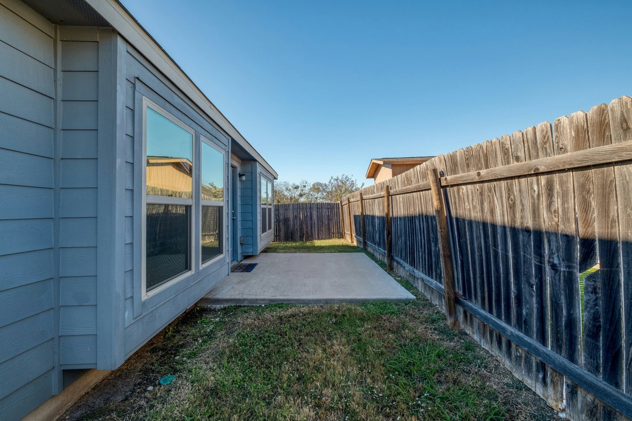Rare Cul-de-Sac Gem in Manor – With No Neighbor on One Side and Access to HOA-owned Greenspace Right Outside Your Doorstep!
